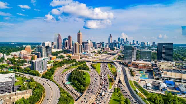 aerial image of a highway going through a large city